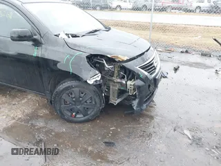 2014 Nissan Versa S Plus with VIN 3N1CN7AP4EL830397, listed as a IAAI auction lot 41465268 with 143,060 mi miles and . Bid and sale history available at DreamBid. Image 6.