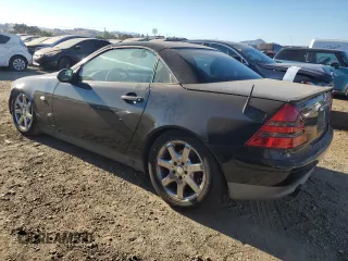 1999 Mercedes-Benz SLK-Class with VIN WDBKK47F2XF102913, listed as a Copart auction lot 76196644 with 112,119 mi miles and Clean Title. Bid and sale history available at carsss.com. Image 2.