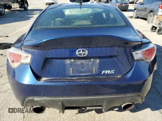 2014 Scion FR-S with VIN JF1ZNAA14E8700043, listed as a Copart auction lot 49283575 with 107,319 mi miles and Salvage Title. Bid and sale history available at DreamBid. Image 6.