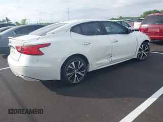 2017 Nissan Maxima SV z VIN 1N4AA6AP8HC365378, wystawiony jako IAAI lot #41984258 z przebiegiem 159 267 mil mil oraz . Historia ofert i sprzedaży dostępna na DreamBid. Obrazek 4.