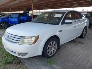 2008 Ford Taurus SEL z VIN 1FAHP24W68G143505, wystawiony jako IAAI lot #41932592 z przebiegiem 238 542 mil mil oraz . Historia ofert i sprzedaży dostępna na DreamBid. Obrazek 2.