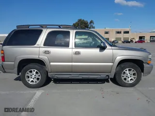 2001 Chevrolet Tahoe LS with VIN 1GNEK13T51R184450, listed as a IAAI auction lot 41773131 with 290,093 mi miles. Bid and sale history available at carsss.com. Image 13.