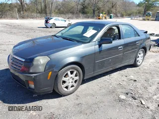 2005 Cadillac CTS with VIN 1G6DP567150204346, listed as a IAAI auction lot 41643967 with 214,221 mi miles. Bid and sale history available at carsss.com. Image 2.