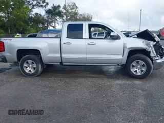 2019 Chevrolet Silverado 1500 LT with VIN 2GCVKPECXK1158607, listed as a IAAI auction lot 41116624 with 72,822 mi miles and . Bid and sale history available at DreamBid. Image 13.