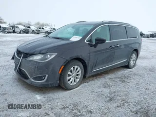 2018 Chrysler Pacifica Touring L Plus z VIN 2C4RC1EGXJR261251, wystawiony jako IAAI lot #41180745 z przebiegiem 82 548 mil mil oraz . Historia ofert i sprzedaży dostępna na DreamBid. Obrazek 22.