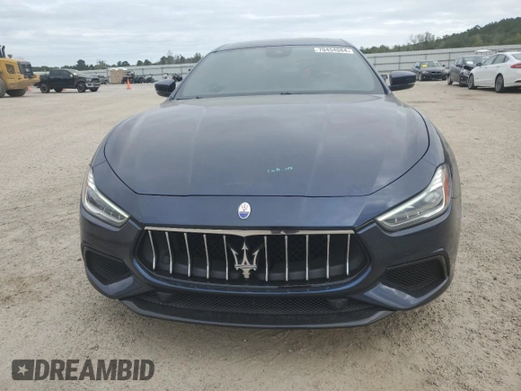 2019 Maserati Ghibli with VIN ZAM57XSS3K1319197, listed as a Copart auction lot 70454084 with 28,584 mi miles and Salvage Title. Bid and sale history available at carsss.com. Image 5.