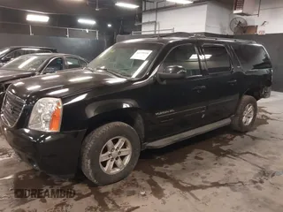 2013 GMC Yukon XL SLT with VIN 1GKS2KE76DR301365, listed as a IAAI auction lot 41379118 with 108,569 mi miles. Bid and sale history available at carsss.com. Image 2.