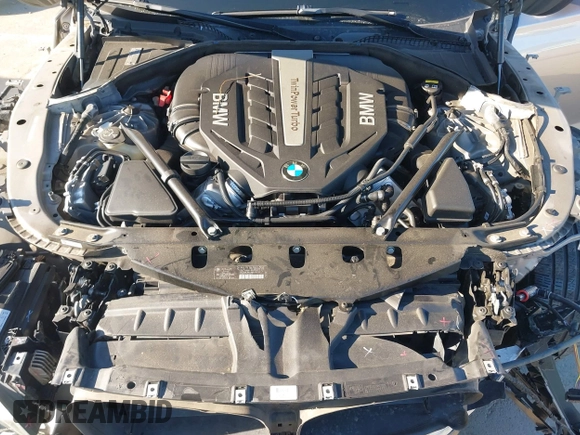 2015 BMW 7 Series 750Li with VIN WBAYE8C55FD782384, listed as a IAAI auction lot 41319363 with 75,784 mi miles. Bid and sale history available at carsss.com. Image 10.