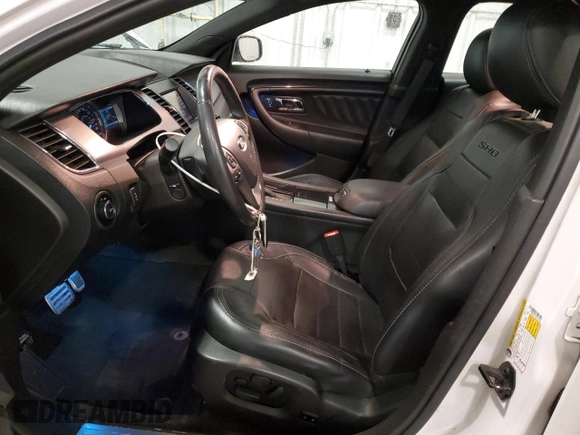 2015 Ford Taurus SHO z VIN 1FAHP2KT1FG157026, wystawiony jako Copart lot #52846065 z przebiegiem 125 107 mil mil oraz Szkoda całkowita • Salvage title. Historia ofert i sprzedaży dostępna na DreamBid. Obrazek 7.