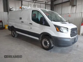 2015 Ford Transit Cargo z VIN 1FTNR1ZM2FKA55134, wystawiony jako IAAI lot #42193601 z przebiegiem 96 231 mil mil oraz . Historia ofert i sprzedaży dostępna na DreamBid. Obrazek 1.