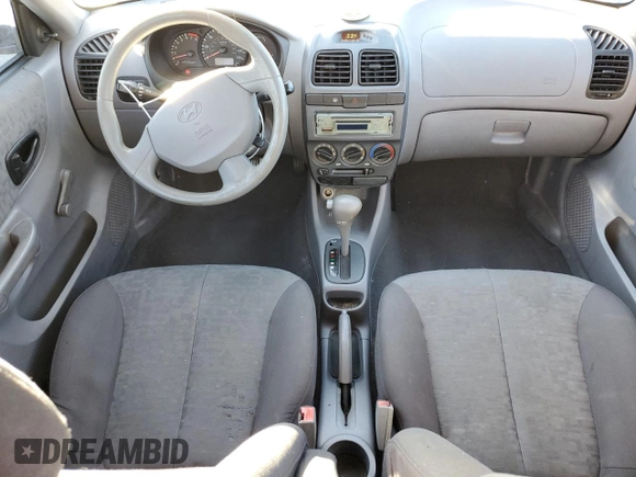 2005 Hyundai Accent GLS with VIN KMHCG45C95U665574, listed as a Copart auction lot 82603804 with 154,187 mi miles and Salvage Title. Bid and sale history available at carsss.com. Image 8.