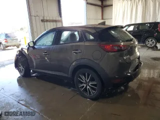 2018 Mazda CX-3 Touring with VIN JM1DKFC72J0301166, listed as a Copart auction lot 76936564 with 92,113 mi miles and Salvage Title. Bid and sale history available at carsss.com. Image 2.
