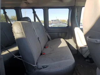2012 GMC Savana z VIN 1GJZ71FG8C1132413, wystawiony jako Copart lot #74216844 z przebiegiem 145 959 mil mil oraz Szkoda całkowita • Salvage title. Historia ofert i sprzedaży dostępna na DreamBid. Obrazek 11.