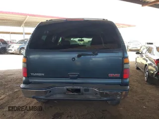 2004 GMC Yukon SLT with VIN 1GKEC13V94J125366, listed as a IAAI auction lot 42089017 with 287,827 mi miles. Bid and sale history available at carsss.com. Image 16.