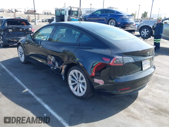 2022 Tesla Model 3 Long Range with VIN 5YJ3E1EB1NF133356, listed as a IAAI auction lot 41568303 with 73,406 mi miles and . Bid and sale history available at DreamBid. Image 3.