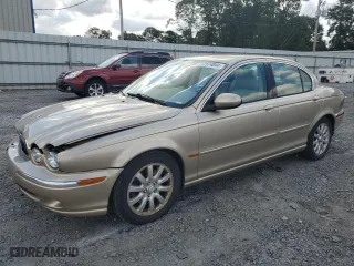 2003 Jaguar X-Type 2.5L Manual with VIN SAJEA51D93XD03179, listed as a Copart auction lot 72574844 with 134,414 mi miles and Salvage Title. Bid and sale history available at carsss.com. Image 1.