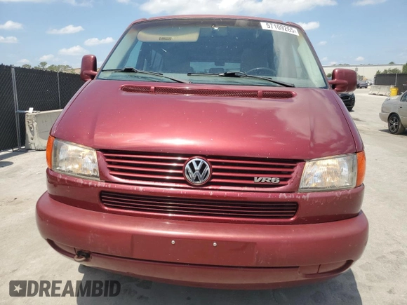 1999 Volkswagen EuroVan с VIN WV2MH2703XH045037, выставлен на аукционе Copart как лот 57109265 с пробегом 265 855 миль миль и Списание • Salvage title. История ставок и продаж доступна на DreamBid. Изображение 5.