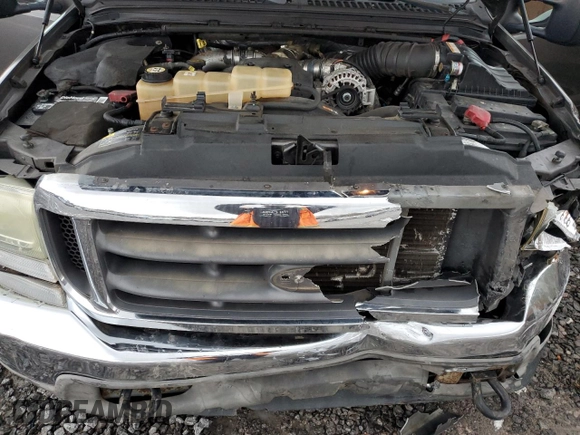 2003 Ford F-250 XL z VIN 1FTNX20F73EA04409, wystawiony jako Copart lot #84228714 z przebiegiem 142 641 mil mil oraz Szkoda całkowita • Salvage title. Historia ofert i sprzedaży dostępna na DreamBid. Obrazek 11.