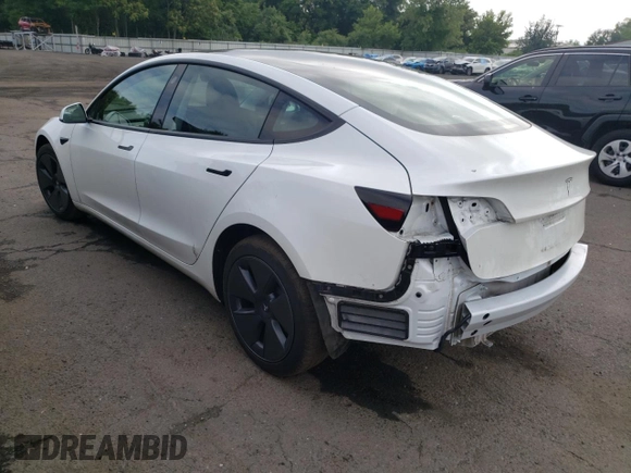 2023 Tesla Model 3 with VIN 5YJ3E1EA6PF563331, listed as a Copart auction lot 61124715 with 26,198 mi miles and Salvage title. Bid and sale history available at DreamBid. Image 2.