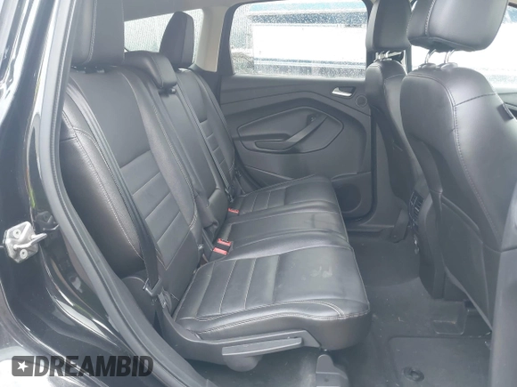2013 Ford Escape SEL with VIN 1FMCU9H93DUC79592, listed as a IAAI auction lot 42039037 with 63,020 mi miles and . Bid and sale history available at DreamBid. Image 8.