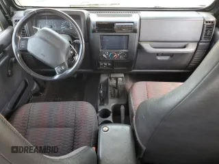 1999 Jeep Wrangler Sport with VIN 1J4FY19S9XP423684, listed as a Copart auction lot 55079455 with 149,756 mi miles and Salvage Title. Bid and sale history available at carsss.com. Image 8.