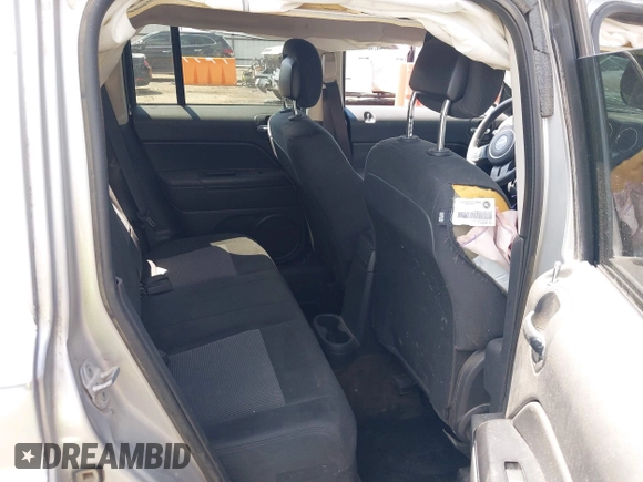 2014 Jeep Patriot Latitude with VIN 1C4NJRFB0ED549410, listed as a IAAI auction lot 42227402 with 139,908 mi miles and . Bid and sale history available at DreamBid. Image 8.