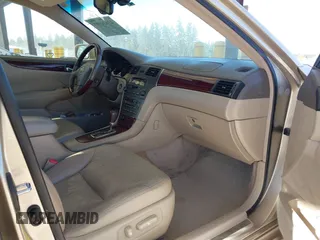 2004 Lexus ES 330 with VIN JTHBA30G340003869, listed as a IAAI auction lot 42024907 with 240,425 mi miles. Bid and sale history available at carsss.com. Image 5.