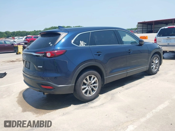 2018 Mazda CX-9 Touring with VIN JM3TCBCY3J0220372, listed as a IAAI auction lot 42405192 with 104,556 mi miles and . Bid and sale history available at DreamBid. Image 4.
