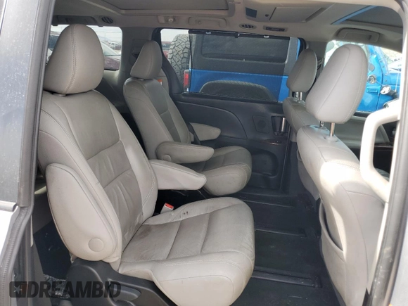 2015 Toyota Sienna Limited z VIN 5TDDK3DC5FS127754, wystawiony jako Copart lot #57437715 z przebiegiem 99 496 mil mil oraz Szkoda całkowita • Salvage title. Historia ofert i sprzedaży dostępna na DreamBid. Obrazek 11.