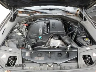 2014 BMW 5 Series 535i xDrive z VIN WBA5B3C5XED539389, wystawiony jako Copart lot #57290835 z przebiegiem 136 560 mil mil oraz Szkoda całkowita • Salvage title. Historia ofert i sprzedaży dostępna na DreamBid. Obrazek 11.