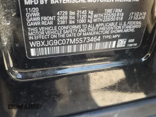 2021 BMW X1 xDrive28i z VIN WBXJG9C07M5S73464, wystawiony jako Copart lot #50374525 z przebiegiem 117 828 mil mil oraz Tytuł czysty. Historia ofert i sprzedaży dostępna na DreamBid. Obrazek 16.