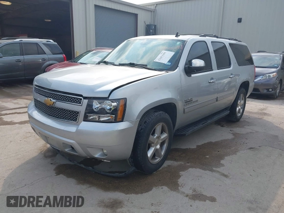 2013 Chevrolet Suburban LT with VIN 1GNSCJE03DR164477, listed as a IAAI auction lot 42083985 with 150,540 mi miles and . Bid and sale history available at DreamBid. Image 17.