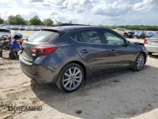 2017 Mazda 3 Touring with VIN 3MZBN1L77HM117864, listed as a Copart auction lot 51895385 with 63,076 mi miles and Salvage Title. Bid and sale history available at carsss.com. Image 3.