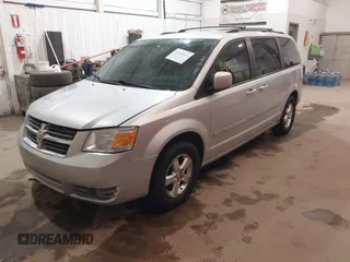 2008 Dodge Grand Caravan SXT with VIN 1D8HN54P18B129536, listed as a IAAI auction lot 41844874 with 260,000 mi miles and . Bid and sale history available at DreamBid. Image 2.