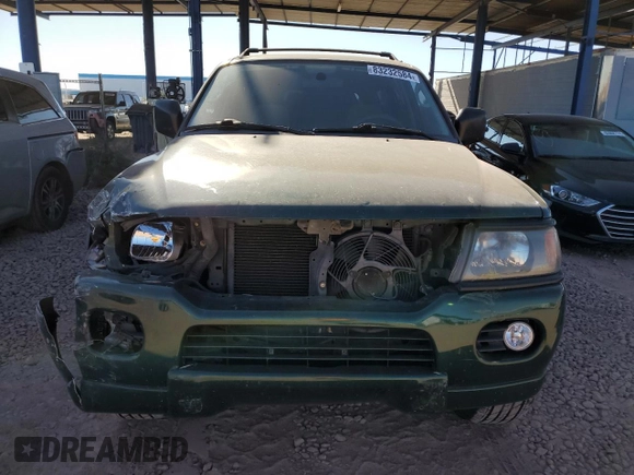 2000 Mitsubishi Montero LS z VIN JA4MT31H0YP015030, wystawiony jako Copart lot #83232584 z przebiegiem 75 294 mil mil oraz Szkoda całkowita • Salvage title. Historia ofert i sprzedaży dostępna na DreamBid. Obrazek 5.