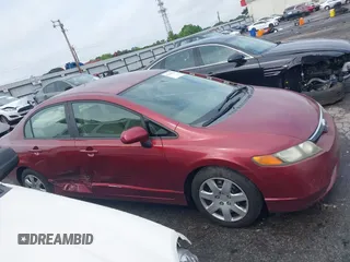 2008 Honda Civic LX z VIN 1HGFA16518L058985, wystawiony jako IAAI lot #42209026 z przebiegiem 140 395 mil mil oraz . Historia ofert i sprzedaży dostępna na DreamBid. Obrazek 13.