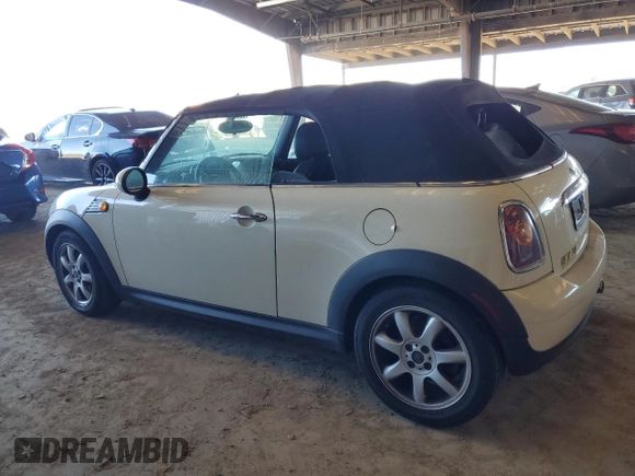 2010 MINI Convertible with VIN WMWMR3C59ATU98390, listed as a Copart auction lot 88820365 with 93,029 mi miles and Clean Title. Bid and sale history available at DreamBid. Image 2.