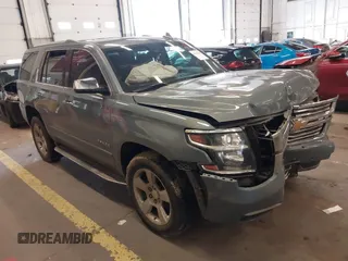 2016 Chevrolet Tahoe LTZ with VIN 1GNSKCKC3GR346276, listed as a IAAI auction lot 41646214 with 102,625 mi miles and . Bid and sale history available at DreamBid. Image 1.