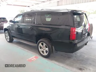 2015 Chevrolet Suburban LT with VIN 1GNSKJKC7FR199544, listed as a IAAI auction lot 42169017 with 219,219 mi miles and . Bid and sale history available at DreamBid. Image 3.