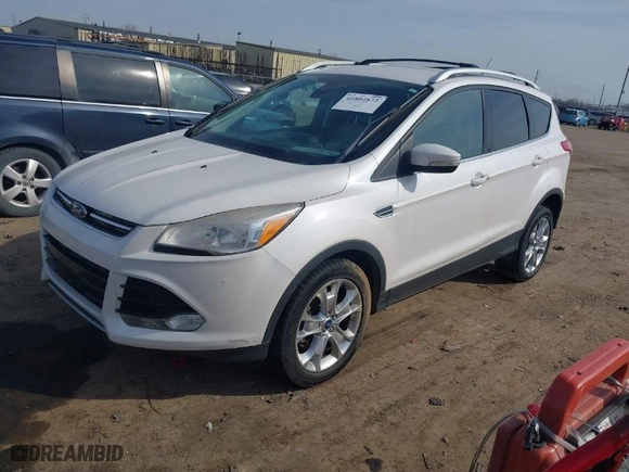 2014 Ford Escape Titanium with VIN 1FMCU9JXXEUC18993, listed as a IAAI auction lot 41802872 with 124,995 mi miles. Bid and sale history available at carsss.com. Image 2.