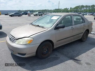 2003 Toyota Corolla CE with VIN 2T1BR32E03C102501, listed as a IAAI auction lot 42158080 with 62,688 mi miles and . Bid and sale history available at DreamBid. Image 2.