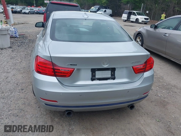 2014 BMW 4 Series 435i xDrive z VIN WBA3R5C54EF784725, wystawiony jako IAAI lot #42291673 z przebiegiem 107 124 mil mil oraz . Historia ofert i sprzedaży dostępna na DreamBid. Obrazek 17.