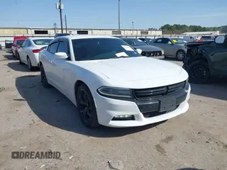 2015 Dodge Charger SXT with VIN 2C3CDXHG8FH725446, listed as a IAAI auction lot 41742400 with 84,579 mi miles and . Bid and sale history available at DreamBid. Image 1.