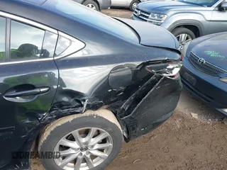 2015 Mazda 6 i Sport with VIN JM1GJ1U5XF1214570, listed as a IAAI auction lot 41003789 with 99,844 mi miles. Bid and sale history available at carsss.com. Image 6.