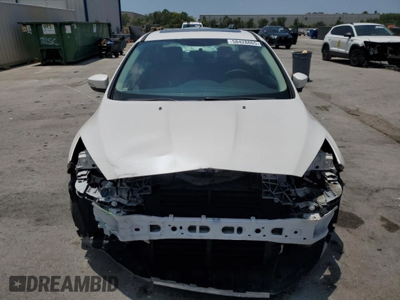 2015 Ford Focus Titanium с VIN 1FADP3J24FL304136, выставлен на аукционе Copart как лот 58428865 с пробегом 81 668 миль миль и Списание • Salvage title. История ставок и продаж доступна на DreamBid. Изображение 5.