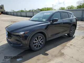 2018 Mazda CX-5 Touring z VIN JM3KFACM8J0330411, wystawiony jako Copart lot #51250365 z przebiegiem 119 741 mil mil oraz Czysty tytuł • Clean title. Historia ofert i sprzedaży dostępna na DreamBid. Obrazek 1.