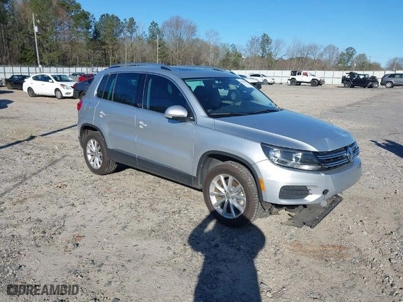 2017 Volkswagen Tiguan Wolfsburg Edition with VIN WVGSV7AX8HK009961, listed as a IAAI auction lot 41822883 with 70,911 mi miles. Bid and sale history available at carsss.com. Image 1.
