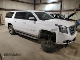 2015 GMC Yukon XL SLT with VIN 1GKS2HKC1FR541866, listed as a Copart auction lot 42756225 with 166,915 mi miles and Salvage Title. Bid and sale history available at carsss.com. Image 4.