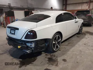2014 Rolls-Royce Wraith z VIN SCA665C59EUX84389, wystawiony jako IAAI lot #41413368 z przebiegiem 57 951 mil mil oraz . Historia ofert i sprzedaży dostępna na DreamBid. Obrazek 4.