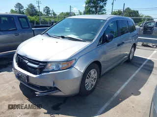 2016 Honda Odyssey LX z VIN 5FNRL5H22GB092614, wystawiony jako IAAI lot #42173633 z przebiegiem 159 387 mil mil oraz . Historia ofert i sprzedaży dostępna na DreamBid. Obrazek 17.